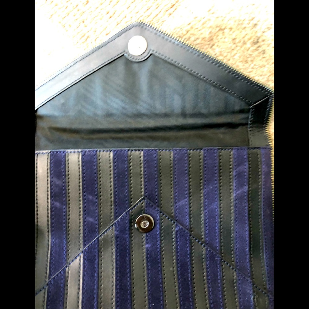 Rebecca minkoff flap clutch , black and blue , worn once, in great condition!